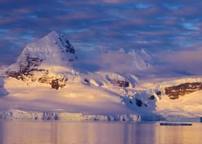 Mountain illuminated by sunset in Antarctica