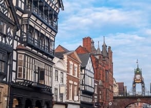 Half-timbered buildings with the Eastgate and Eastgate Clock in the old city of Chester, England