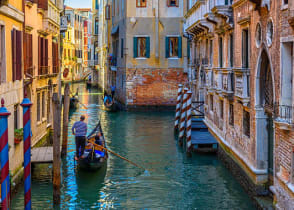 Take an unforgettable gondola ride through Venice at sunset