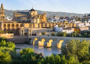 Morning view of the Cathedral, Mezquita and roman bridge in Córdoba, Spain