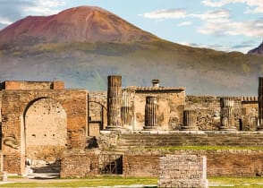 Ancient Roman city of Pompeii and Vesuvius in the background