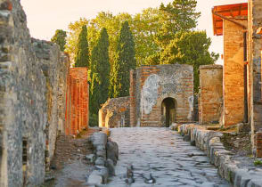 Cobblestone street thru the ruins of Pompeii