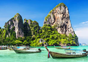 Longtail boats at a beach in Thailand