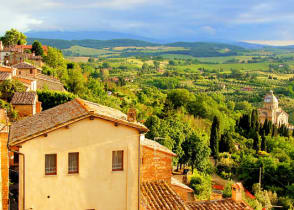 The hilltop town of Montepulciano surrounded by vineyards in Tuscany, Italy