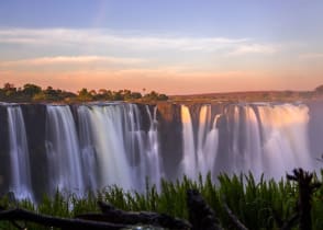 Victoria falls at sunset in Zimbabwe