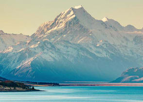 The dramatic peak of Mount Cook will dominate the skyline.