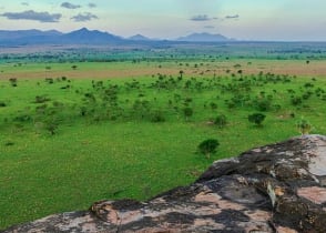 Woman admiring the landscape of Kidepo Valley National Park, Uganda