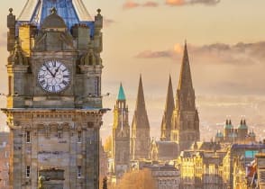 Old town Edinburgh city skyline in Scotland at sunset