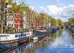 Dutch buildings and canal in Amsterdam, Netherlands