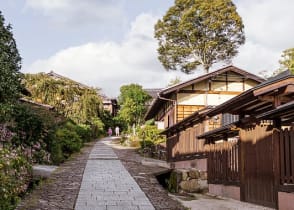 Walking through old town of Magome along the Nakasendo Trail in Japan