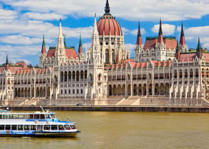 View of the Parliament with boat in Budapest, Hungary