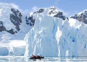 Exploring iceberg off the coast of Antarctica