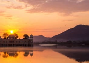 Romantic sunset over Jal Mahal on Man Sagar lake in Jaipur, India