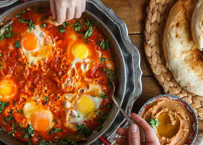 Traditional Shakshuka dish and bread served at a restaurant in Israel