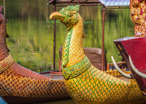 Boat on lake near Bayon temple in Cambodia. 