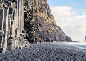 The black sand beach of Reynisfjara and the mount Reynisfjall, Iceland