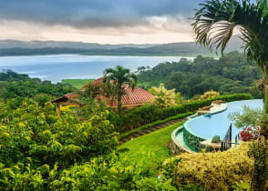 Luxurious vacation in the middle of the rainforest, view of the Arenal Lake and the jungle, Costa Rica