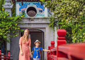 Mother and son on the Hoan Keim Lake Bridge in Hanoi, Vietnam