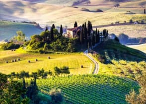 Tuscany landscape with a house on a hilltop