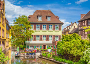 Colorful traditional houses on idyllic river in Colmar, Alsace Region, France