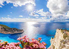 Navagio beach with shipwreck and flowers on Zakynthos island in Greece.