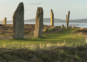 Senior couple hiking at the Ring of Brodger in Orkeny, Scotland