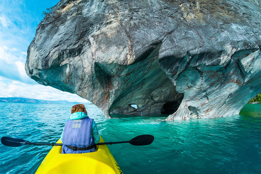 Kayaker at the Marble Caves in Puerto Rio Tranquilo, Chile