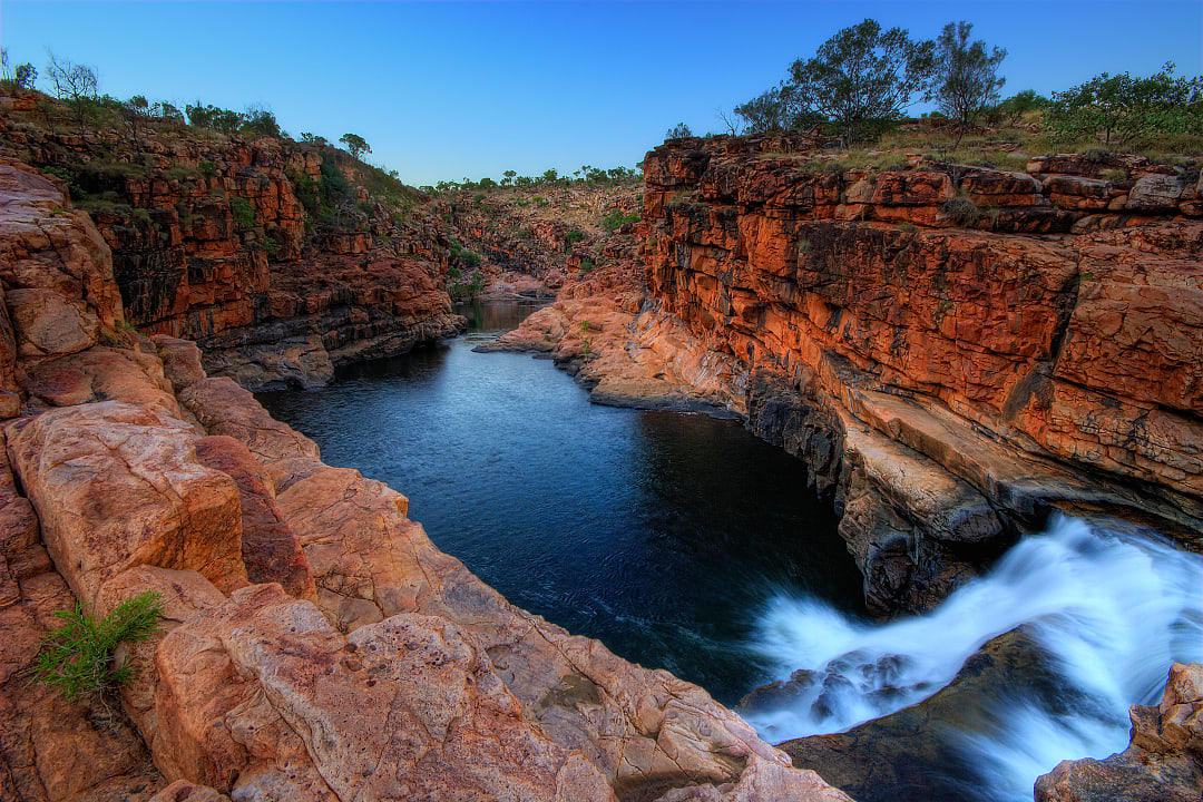 A waterfall and rock-poll formation at Bell Gorge.