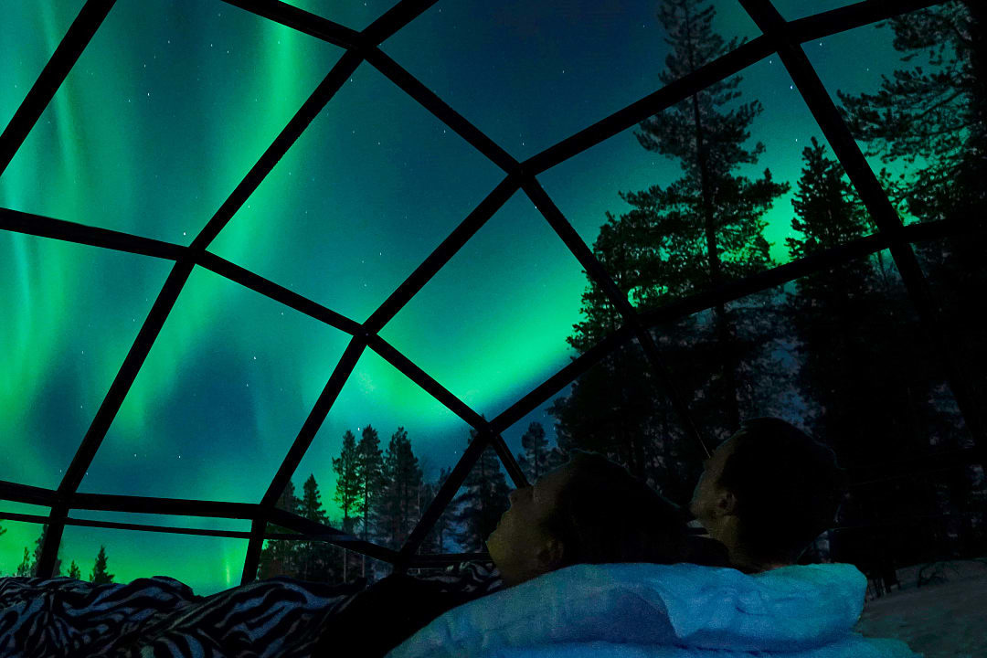 View of the Northern Lights from a glass igloo