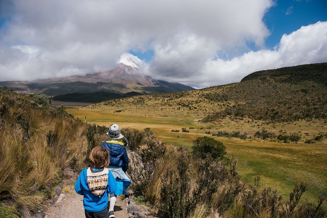 Family hiking at Cotopaxi in Ecuador