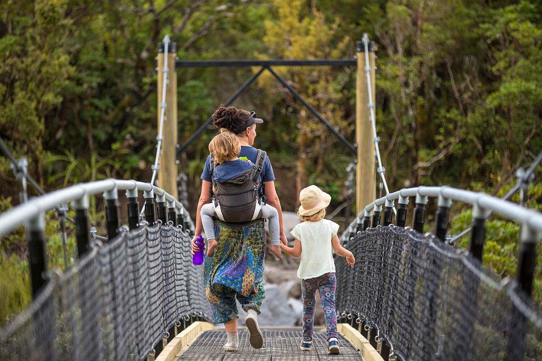 A family enjoys New Zealand's trails in summer