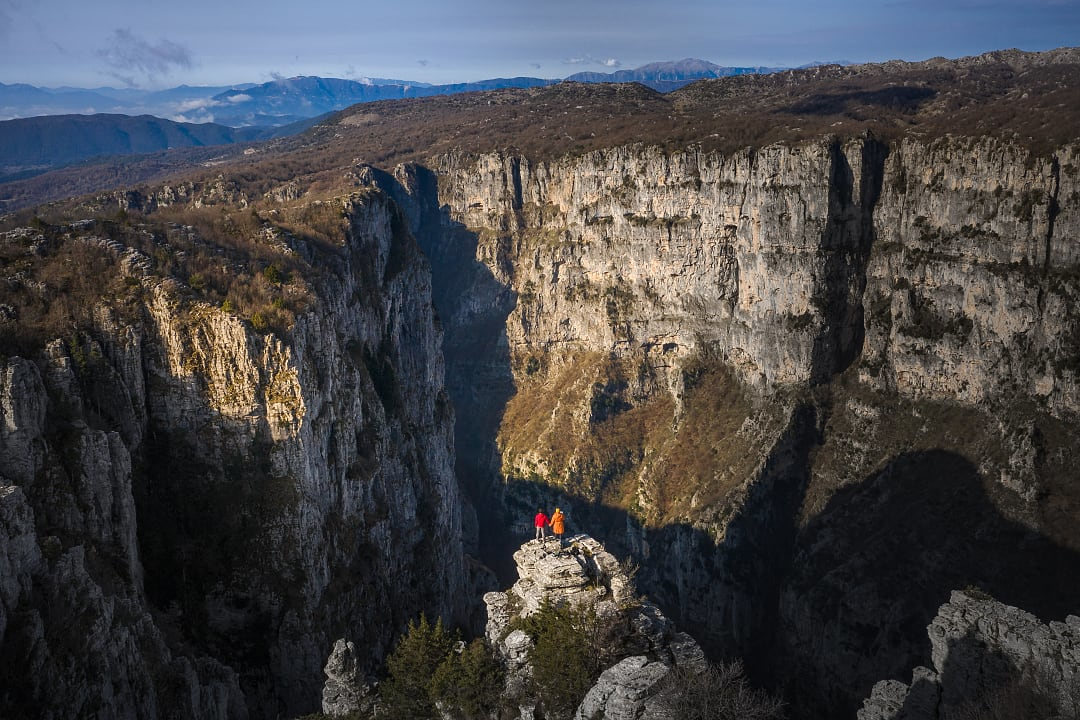 Couple at Vikos Gorge in Zagori, Greece