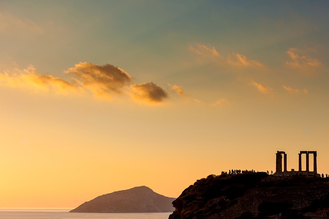 Temple of Poseidon at Cape Sounion during sunset