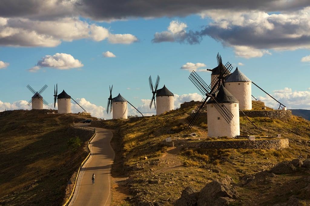 Windmills on the hills of the La Mancha countryside in Spain.