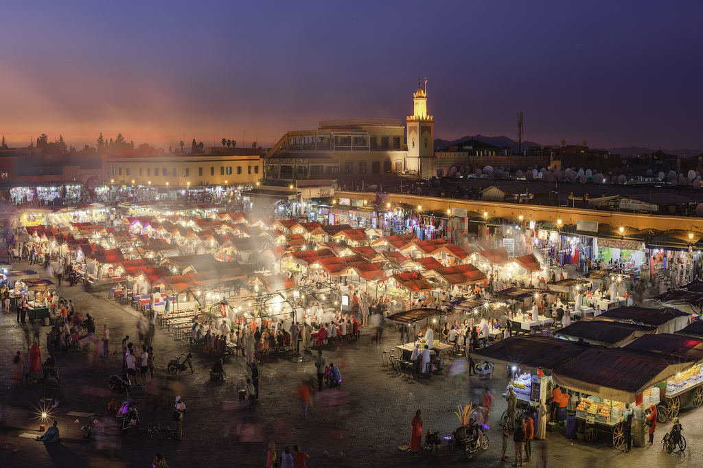Sunset over Djemaa El Fna market in Marrakesh, Morocco