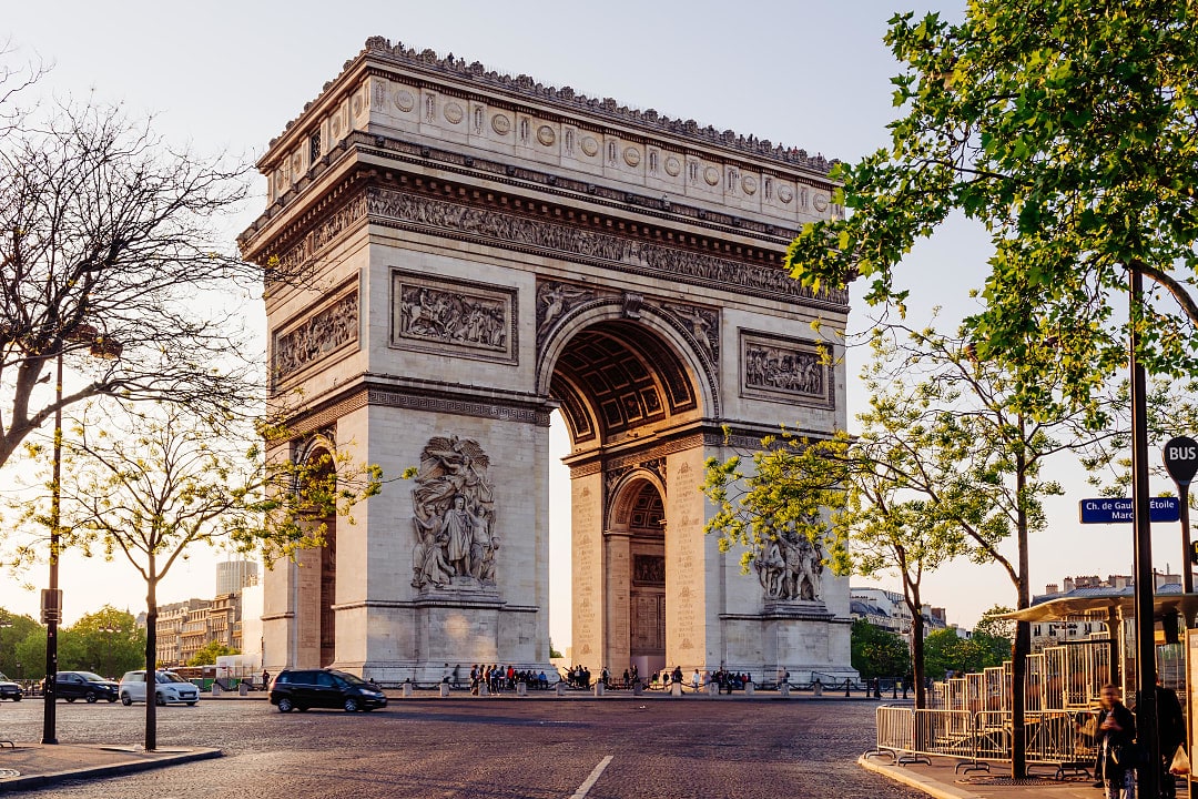 Arc de Triomphe at sunrise in Paris, France
