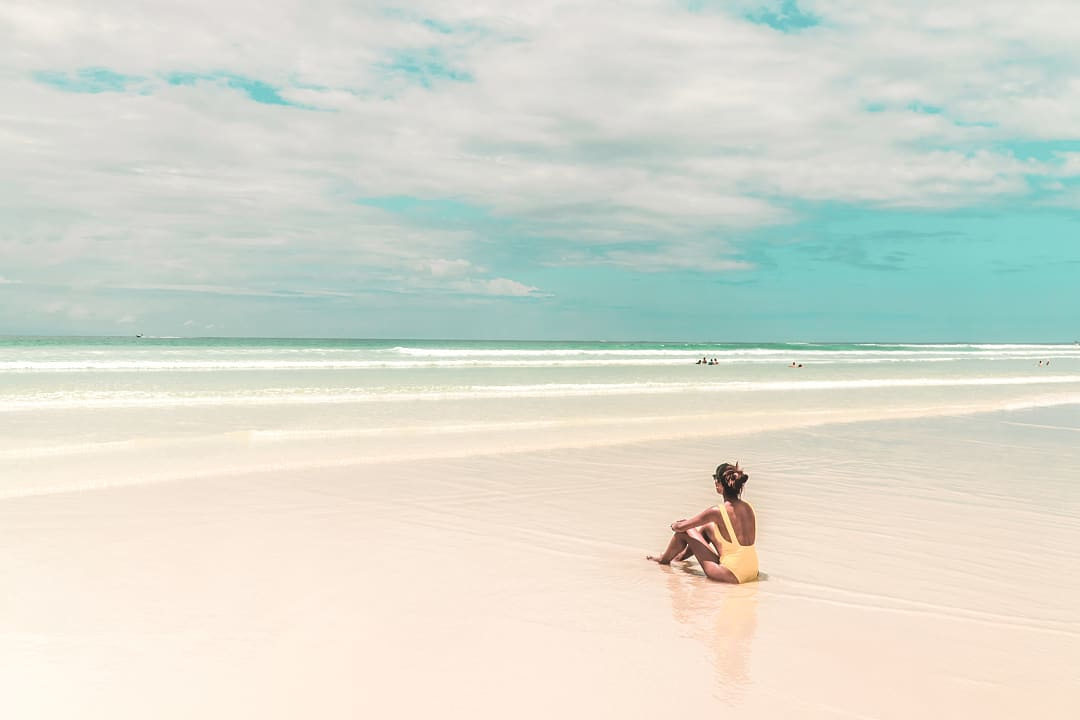 Woman at Playa el Manglecito, San Cristóbal in the Galapagos
