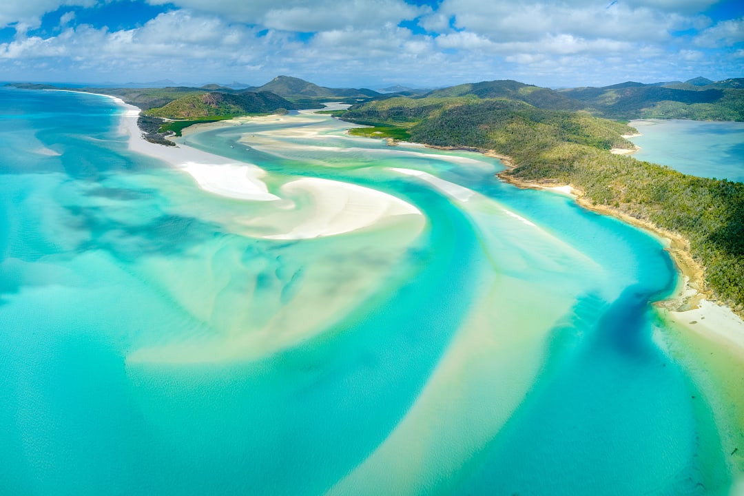 Aerial view of Whitsundays's crystal clear waters, Australia.