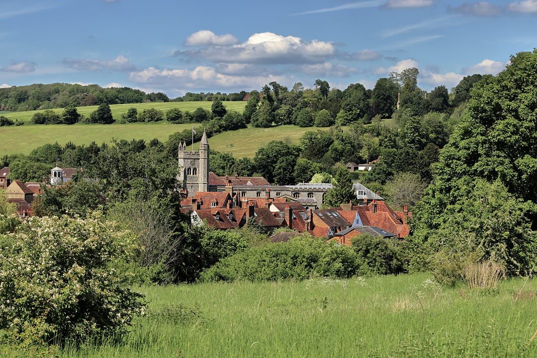 Amersham Old Town village surrounded by green countryside in the Chiltern Hills, England.