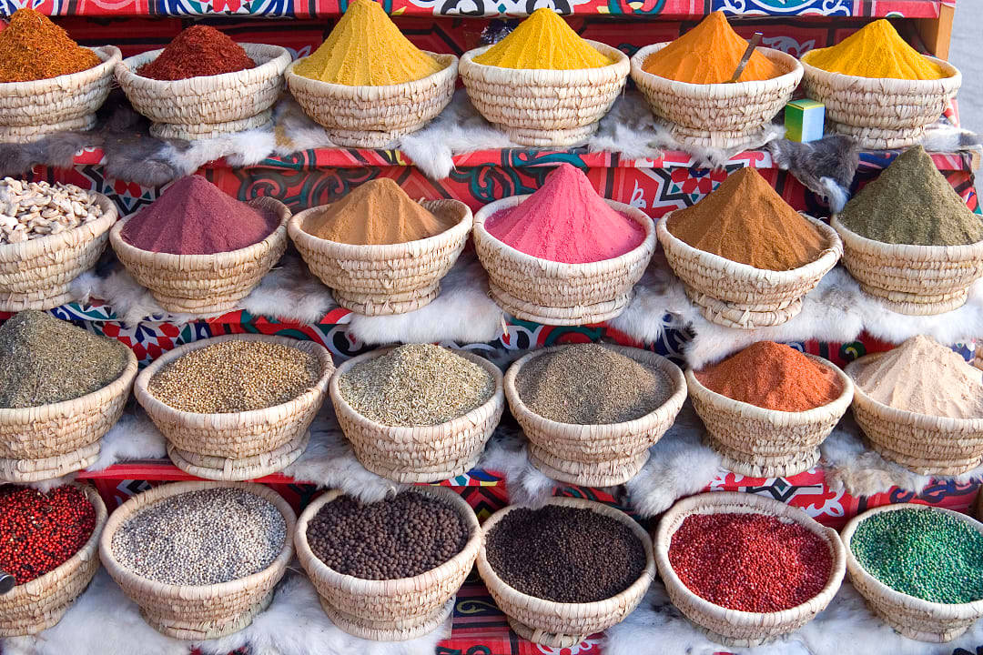 Colorful spices in baskets at a market in Egypt