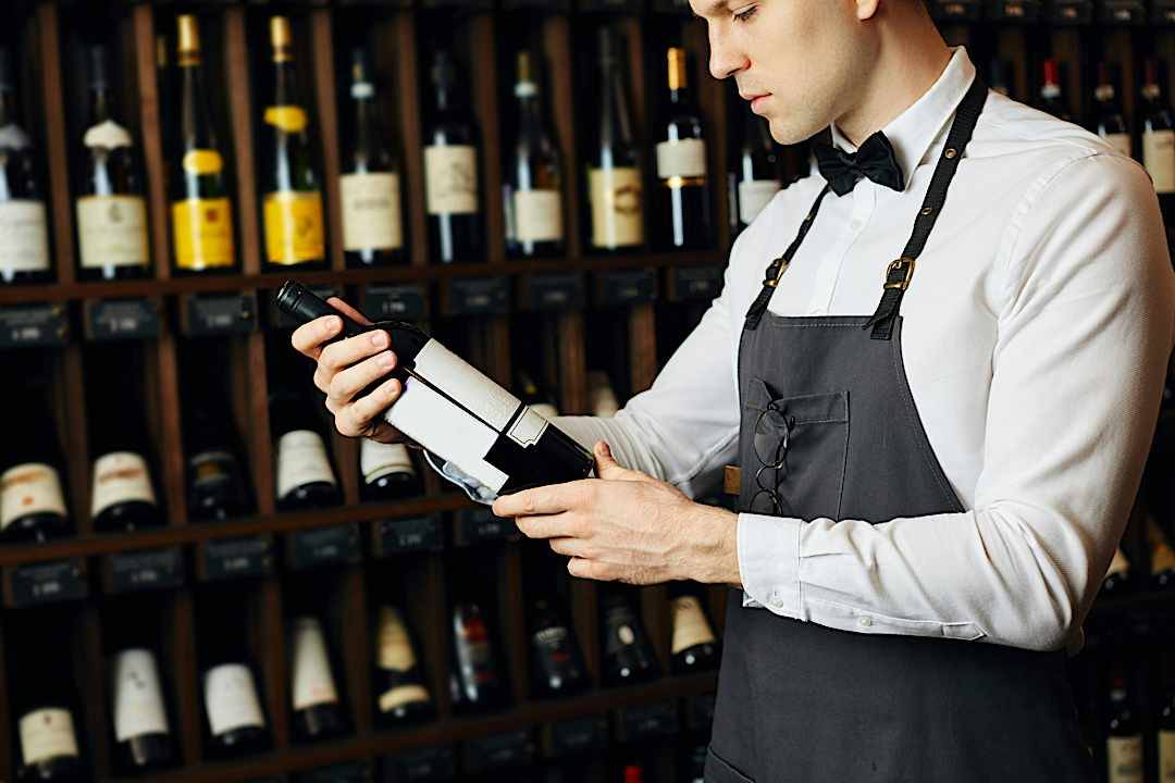 Sommelier curating a wine selection in France
