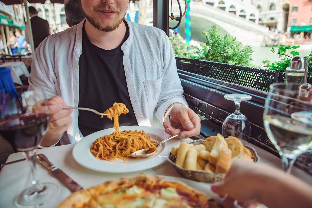 Couple dining in Venice, Italy
