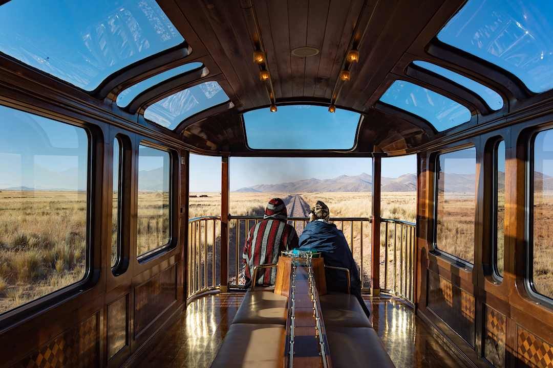 Couple admiring the view of the Altiplano Rail, Peru.
