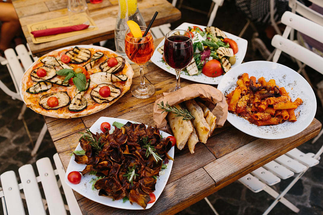 Delicious Italian cuisine served at a cozy outdoor café in Rome.