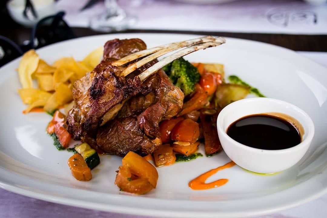 Lamb chops with vegetables serve at a restaurant in Ushuaia, Argentina