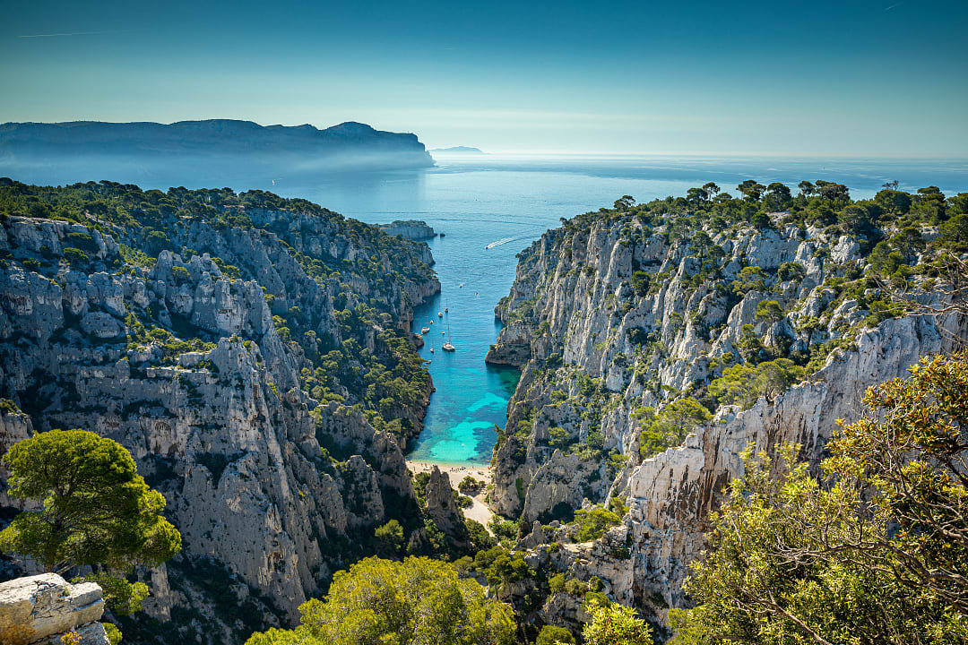 Stunning view of Calanque d'En-Vau, a turquoise inlet surrounded by cliffs near Cassis, France
