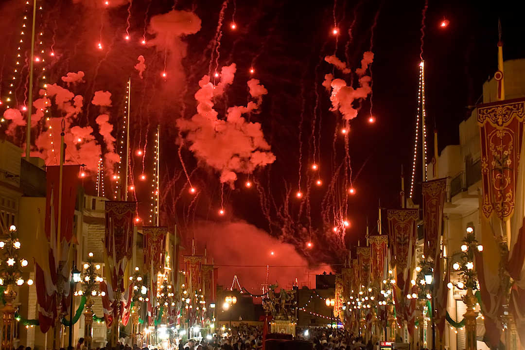 Night festival with fireworks taking place in Malta.