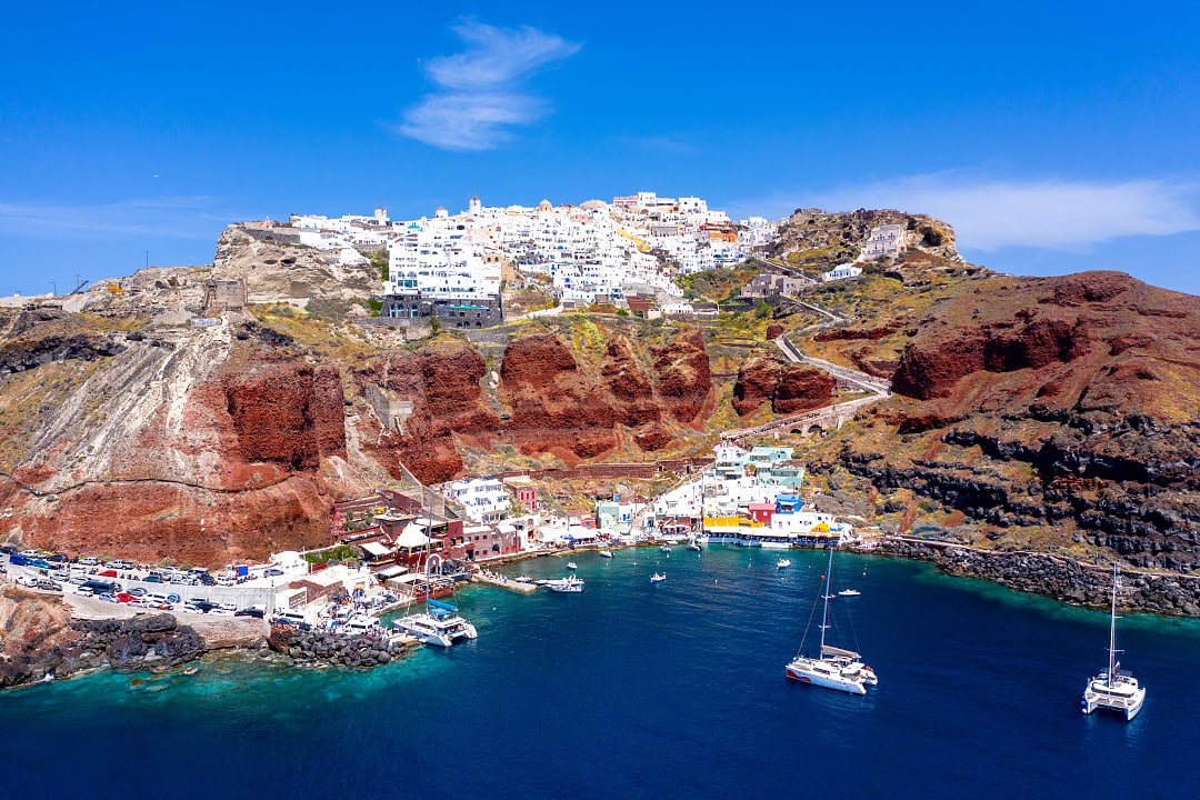 Ammoudi Bay and harbor under the village of Oia on Santorini, Greece