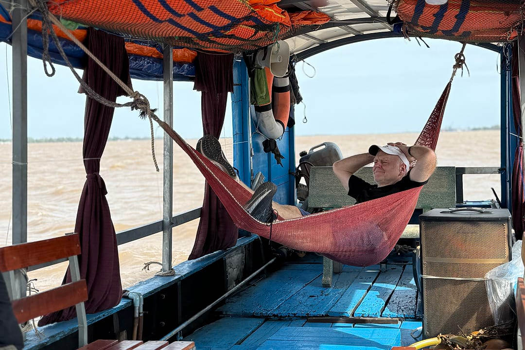 Relaxing in a hammock aboard a river boat in Vietnam