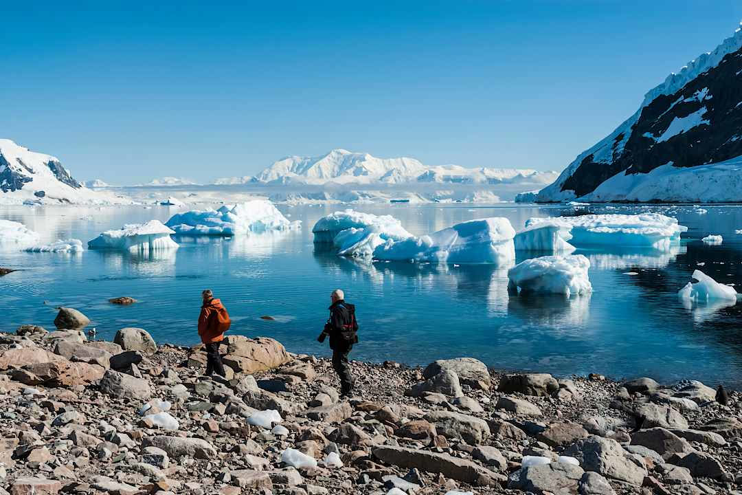 Couple visiting Antarctica.